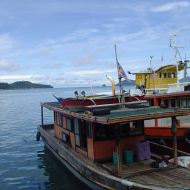 Holidays to Borneo - traditional boats at Sandakan, Borneo