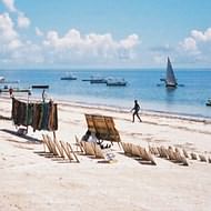 Buying souvenirs on the beach at Mombasa